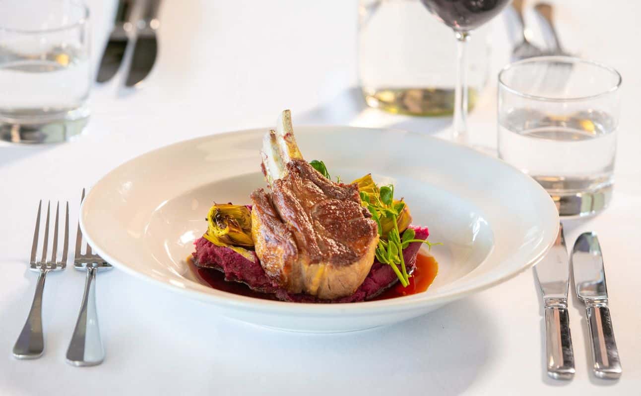 Enjoy New Zealand, Vegetarian options, Hotel restaurant, Wheelchair accessible, Waterfront, Table service, Highchairs available, Child friendly, Free wifi, Free onsite parking, Indoor & outdoor seating, $$$$, Families, Groups, Business meetings, Views, Date night, Live music and Wine bar cuisine at Waiheke Island Resort in Waiheke Island, Auckland